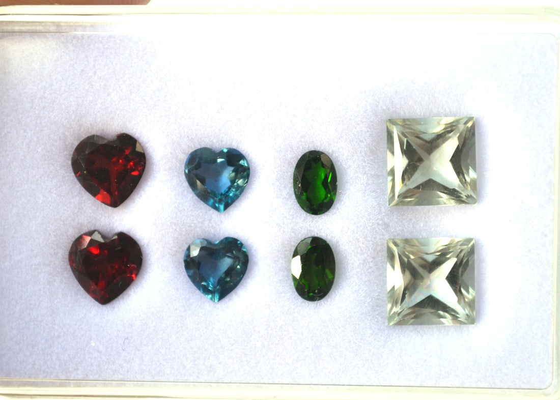 10.87 Carats of Matched Pairs: Beautiful matched pairs. All fine, jewelry grade stones. Included are matched pairs of Garnet, Topaz, Chrome Diopside, and Green Amethyst. Most gems sold online aren't jewelry grade. They're either po
