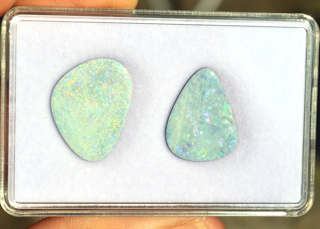 10.80 Carats of Jewelry Grade Australian Opal Doublets: Beautiful Doublets here from Australia. Bright and colorful stones. A Doublet is a thin slice of natural Opal that's protected on the back with a hard rock backing. Most gems sold online aren't