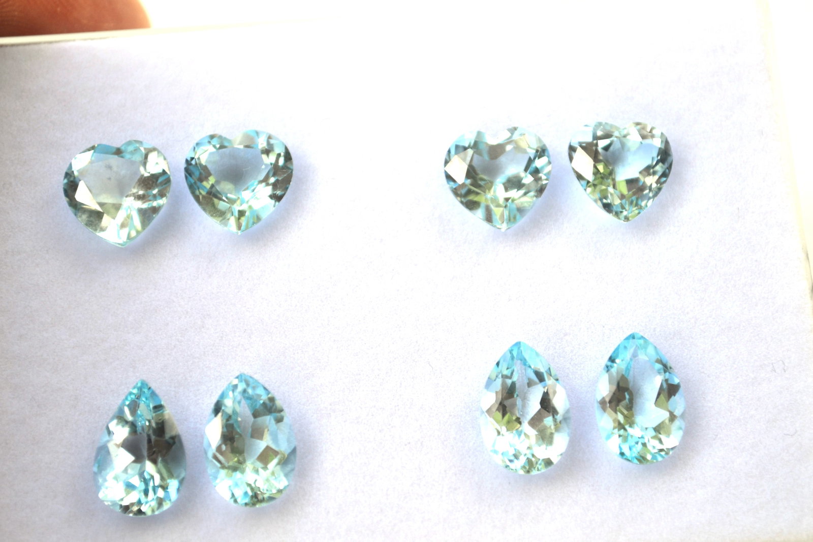 26.28 Carats of Jewelry Grade Topaz Matched Pairs: Just an exceptional set of Topaz matched pairs. Fine Sky Blue color. Amazing jewelry grade stones. Natural stones but heated and irradiated to get their color, as all Blue Topaz are. Most gems sold on