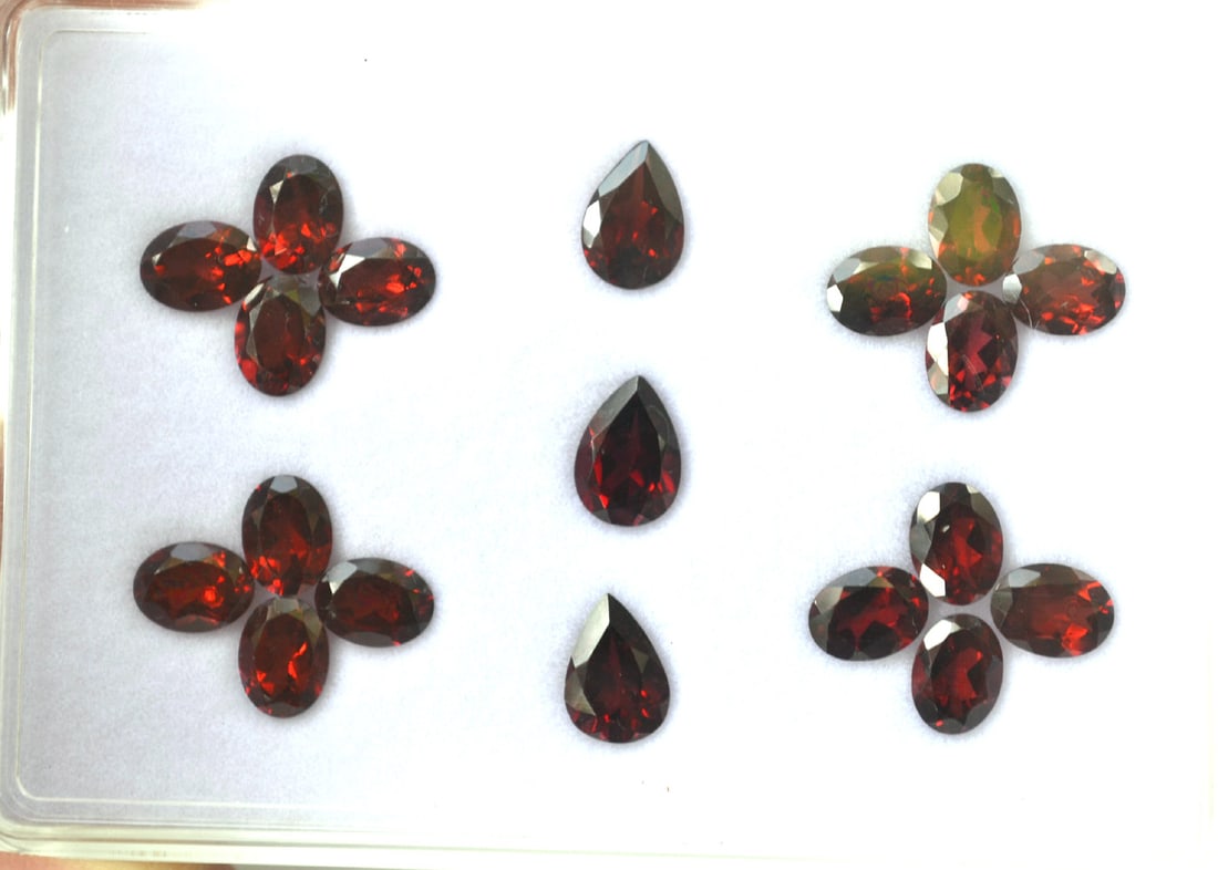 30.00 Carat Matched Set of Jewelry Grade Garnets: Wow, what a set of Garnets here. Just amazing. Rich Strawberry red color. Just an exceptional set of stones for the price. Most gems sold online aren't jewelry grade. They're either poorly cut, have w