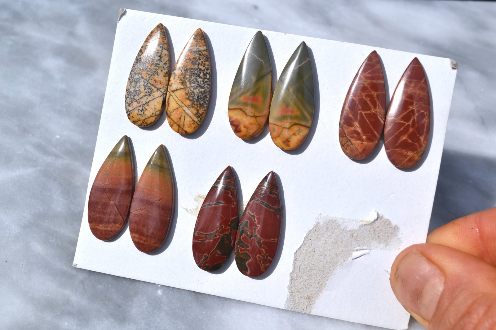 Jewelry Grade, Old Stock Jasper Matched Pairs: Top jewelry grade Jaspers here, arranged in matched pairs. Perfect for the jeweler or amateur jeweler. You aren't going to find nicer Jaspers at this price anywhere else. Tons of cabochons on the