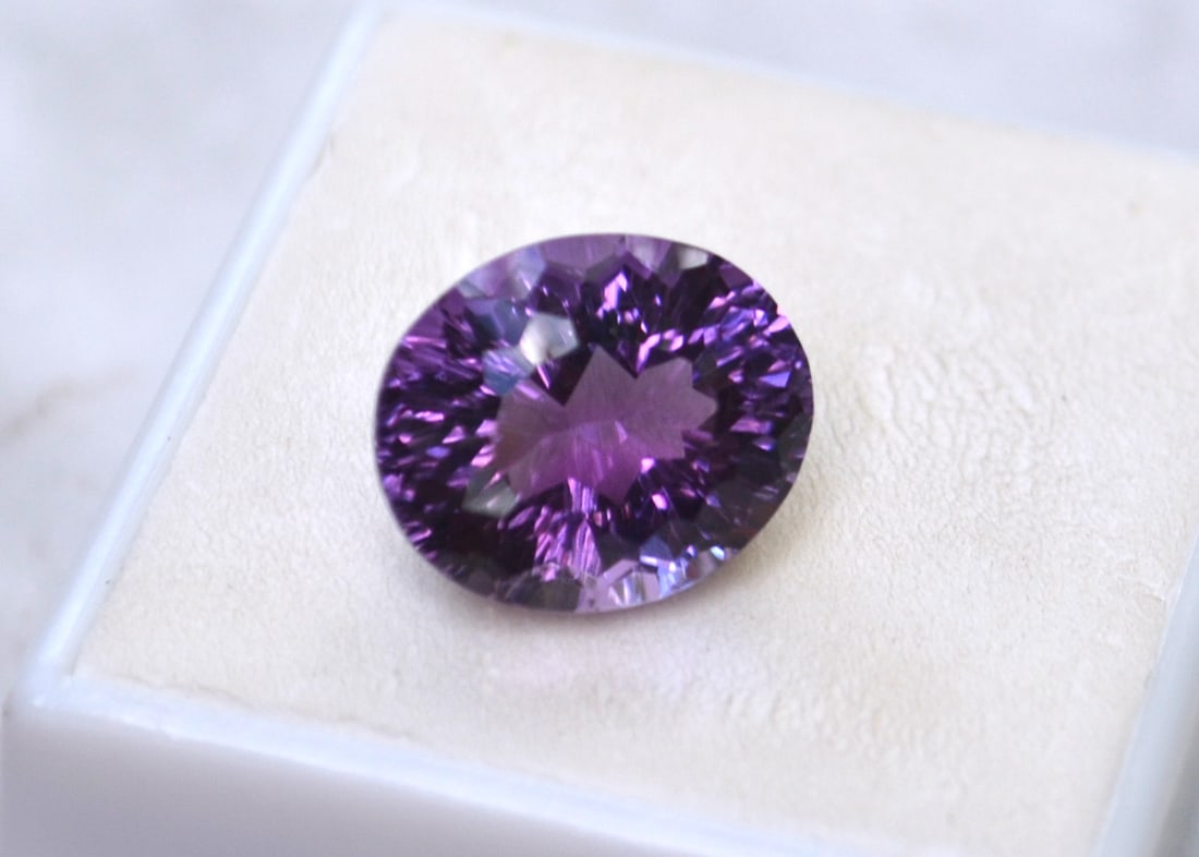 7.59 Carat Fancy Oval Cut Amethyst: Gorgeous Amethyst. Just a great stone in every way and perfect size for jewelry. Natural and untreated. Most gems sold online aren't jewelry grade. They're either poorly cut, have weak color or too