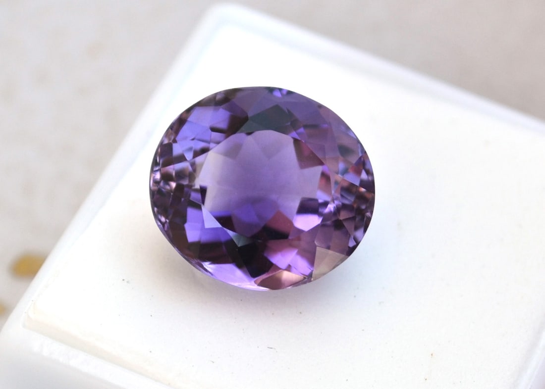 11.14 Carat Oval Cut Amethyst: Beautiful Amethyst. Great color. For Proxibid bidders, shipping is a flat rate of $6, no matter how many lots won. For Live Auctioneers bidders, shipping will be calculated automatically by Live