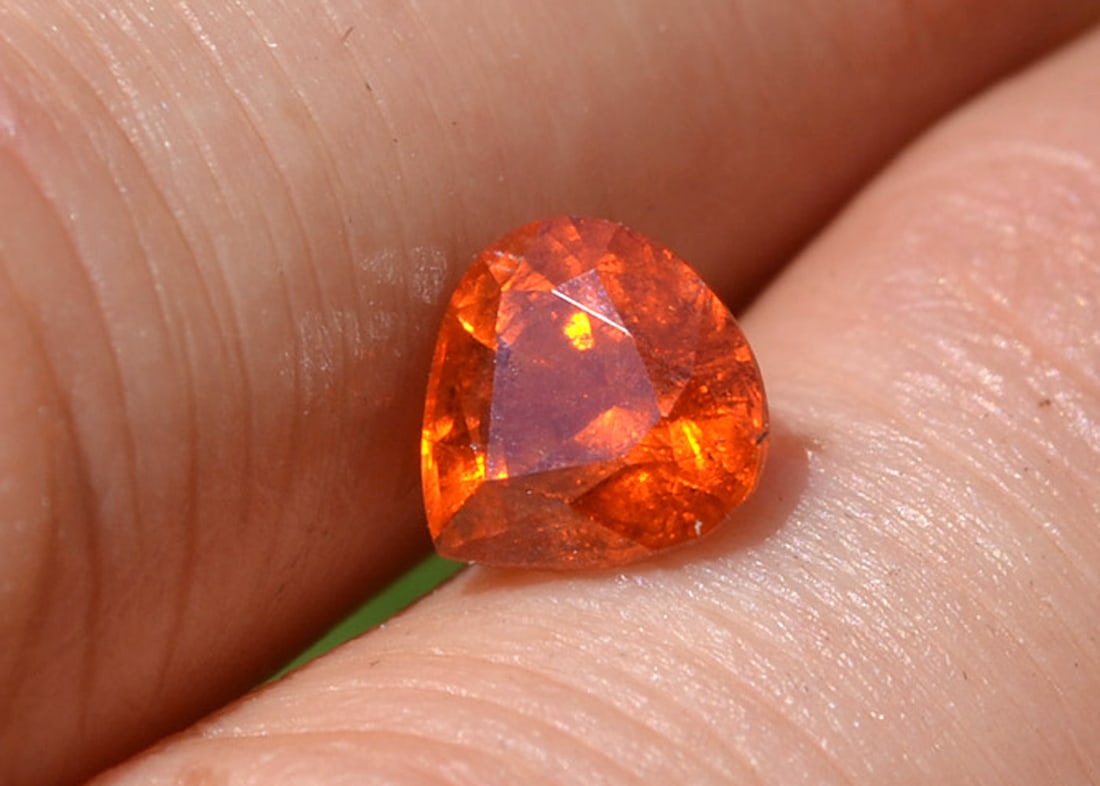 2.44 Carat Pear Cut Spessartite Garnet: Gorgeous Spessartite with top Mandarin Orange color. Some scattered inclusions, but that's very common with this rare form of Garnet. Natural and untreated. For Proxibid bidders, shipping is a flat ra