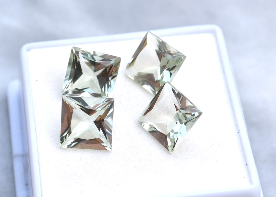 9.78 Carat Matched Set of Princess Cut Green Amethyst: Gorgeous set of Green Amethyst. Very well cut and well matched. Great set for the price. For Proxibid bidders, shipping is a flat rate of $6, no matter how many lots won. For Live Auctioneers
