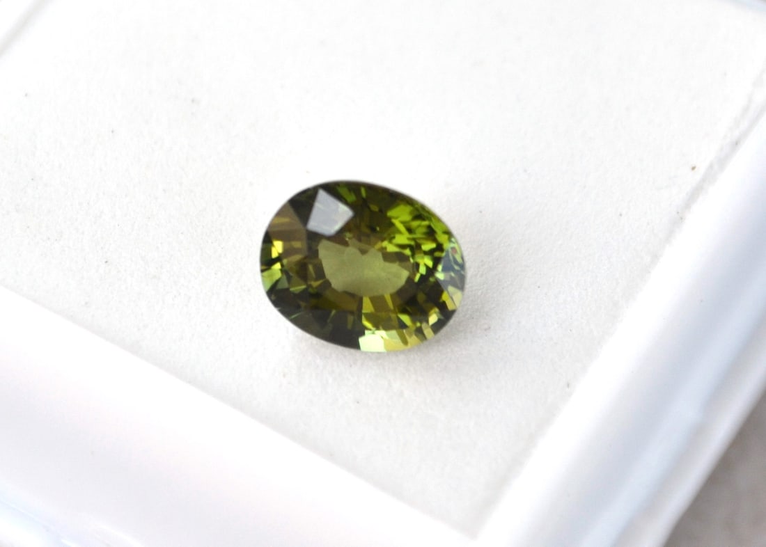 2.18 Carat Oval Cut Tourmaline: Fine Tourmaline with great color. Very bright and lively. Good cutting and clarity also. Natural and untreated. For Proxibid bidders, shipping is a flat rate of $6, no matter how many lots won. For