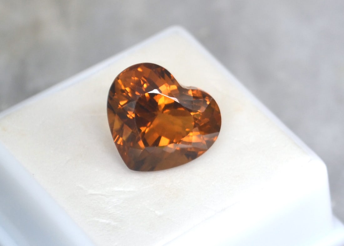 11.57 Carat Heart Shaped Citrine: Gorgeous Citrine. Top quality in every way. Just an exceptional stone. Natural and untreated. Most gems sold online aren't jewelry grade. They're either poorly cut, have weak color or too many