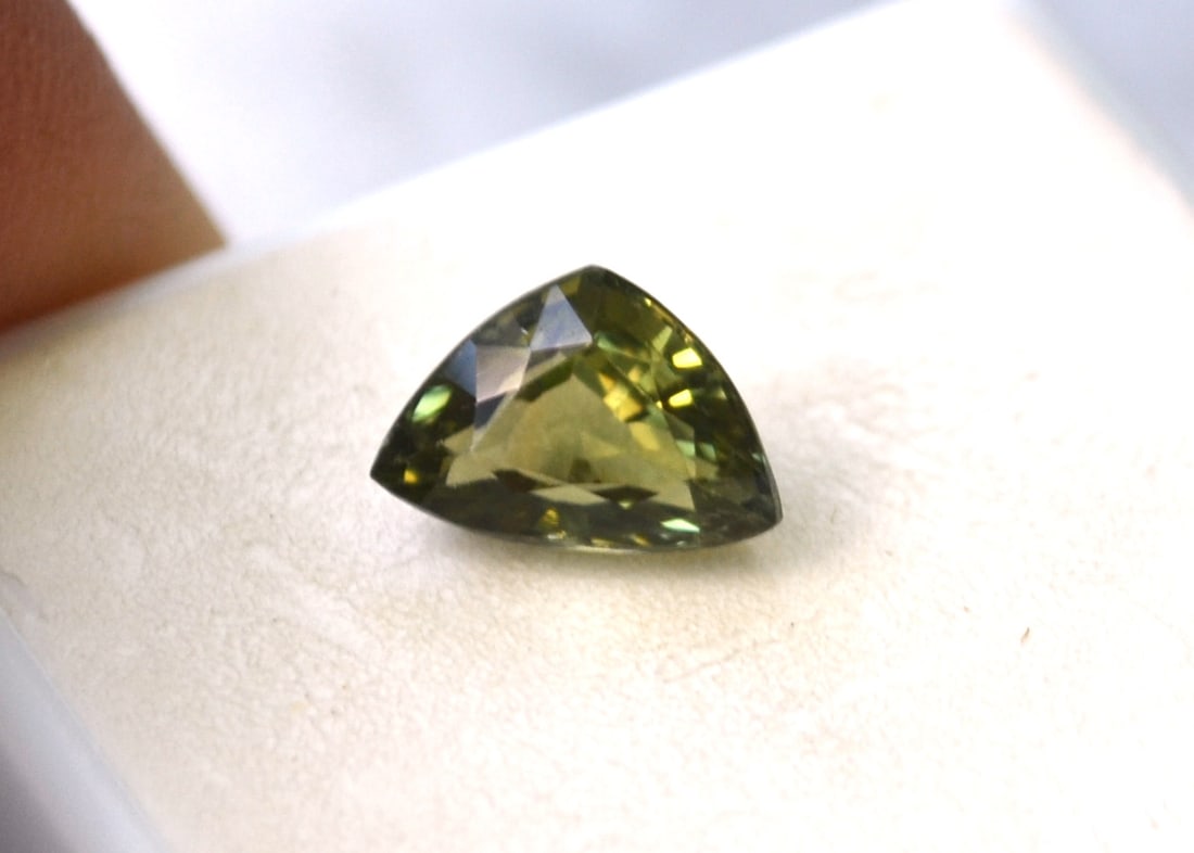 2.03 Carat Fancy Trillion Cut Tourmaline: Great stone. Perfect in every way. Natural and untreated. For Proxibid bidders, shipping is a flat rate of $6, no matter how many lots won. For Live Auctioneers bidders, shipping will be calculated au