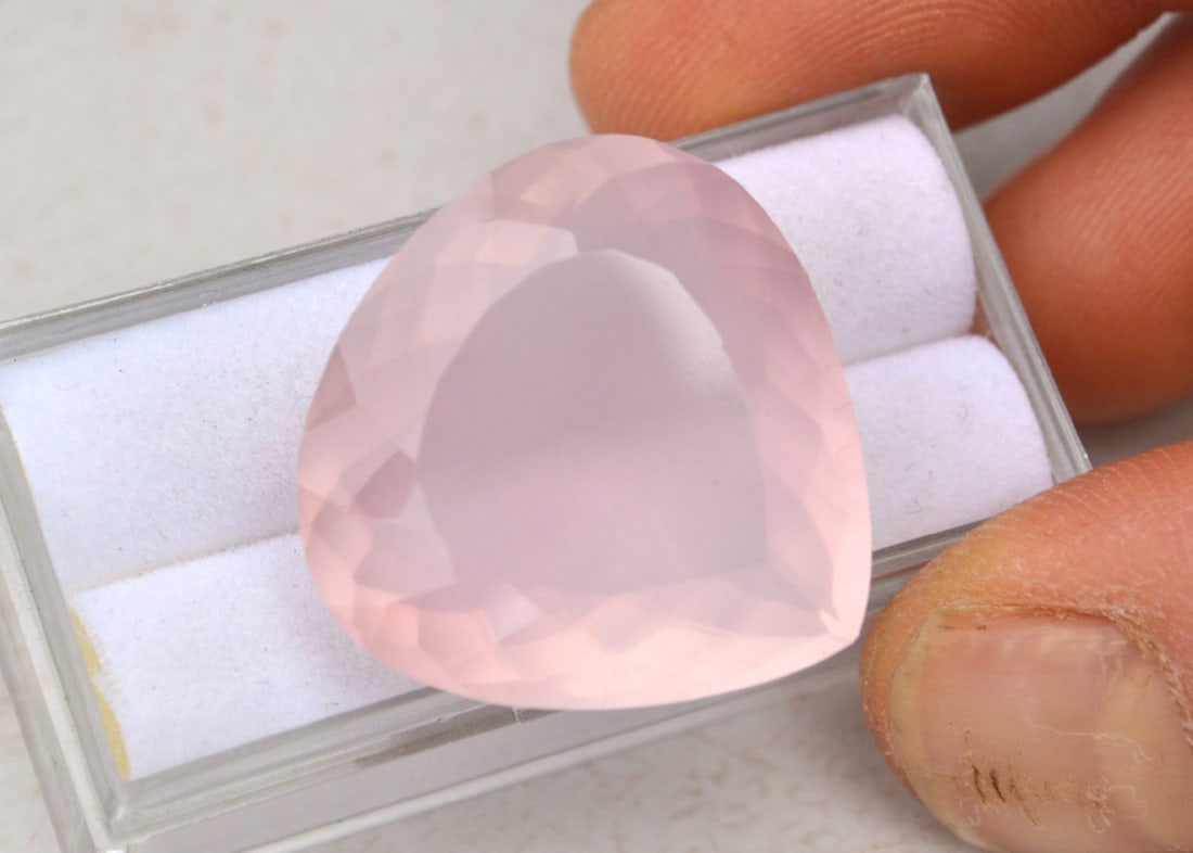 46.52 Carat Pear Cut Rose Quartz: Fantastic example of a gem quality Rose Quartz. Nearly 100% of the Rose Quartz mined is too cloudy or weakly colored to be considered gem quality, and are mostly turned into cabochons. It's very rare