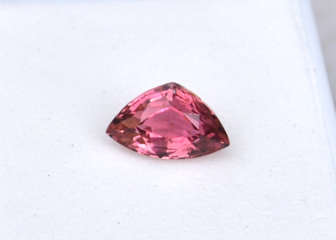 1.91 Carat Fancy Wedge Cut Pink Tourmaline: Nice Tourmaline. Good color and clarity. Natural and untreated gemstone. Most gemstones bought online aren't very high quality. They're generally poorly cut, have weak color and too many inclusions.
