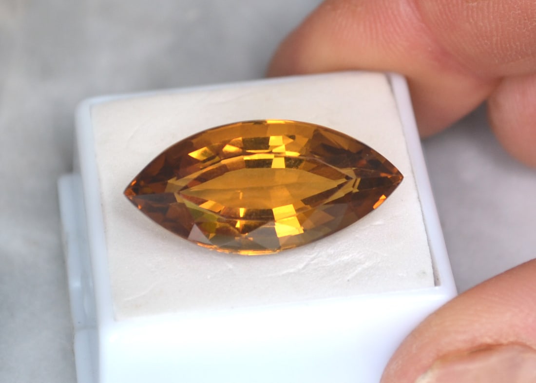 19.73 Carat Fancy Marquise Cut Citrine: Gorgeous Citrine. Top quality in every way. Just an exceptional stone. Natural and untreated. Most gems sold online aren't jewelry grade. They're either poorly cut, have weak color or too many inclusi