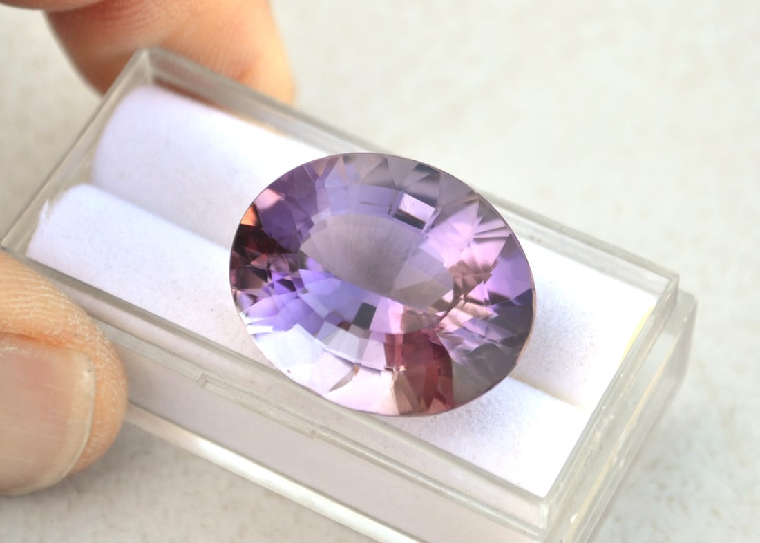 28.53 Carat Fancy Oval Cut Amethyst: Fine Amethyst. Great cutting and color. Natural and untreated. Most gems sold online aren't jewelry grade. They're either poorly cut, have weak color or too many inclusions, giving them the