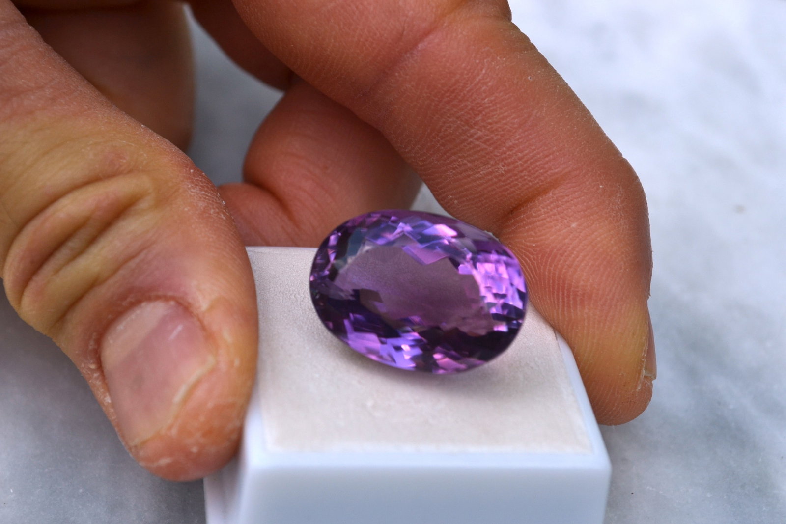 30.29 Carat Oval Cut Amethyst: Fine Amethyst. Great cutting and color. Natural and untreated. Most gems sold online aren't jewelry grade. They're either poorly cut, have weak color or too many inclusions, giving them the designatio