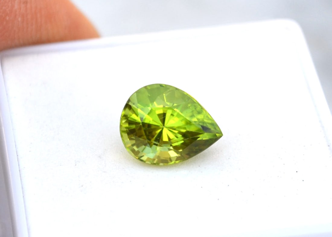 3.46 Carat Pear Cut Peridot: Fantastic Peridot. Top quality stone in every way. Great stone for the price. Natural and untreated. Most gems sold online aren't jewelry grade. They're either poorly cut, have weak color or too many