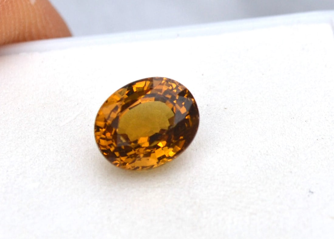 3.13 Carat Oval Cut Yellow Grossular Garnet: Gorgeous Garnet with rich color and minimal inclusions. Just a great stone for the price. Natural and untreated. For Proxibid bidders, shipping is a flat rate of $6, no matter how many lots won. For L