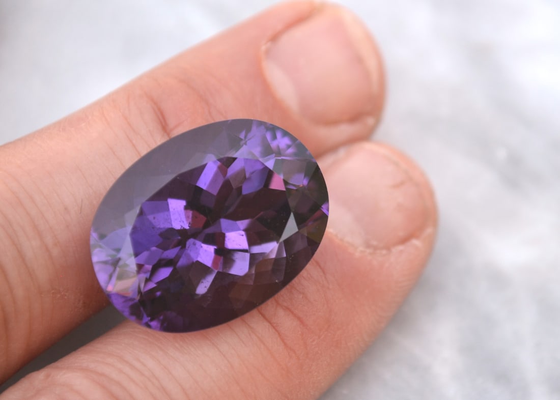 29.87 Carat Oval Cut Old Stock Amethyst: Fantastic Amethyst. Old stock stone from a private collection. Natural and untreated. Most gems sold online aren't jewelry grade. They're either poorly cut, have weak color or too many inclusions,
