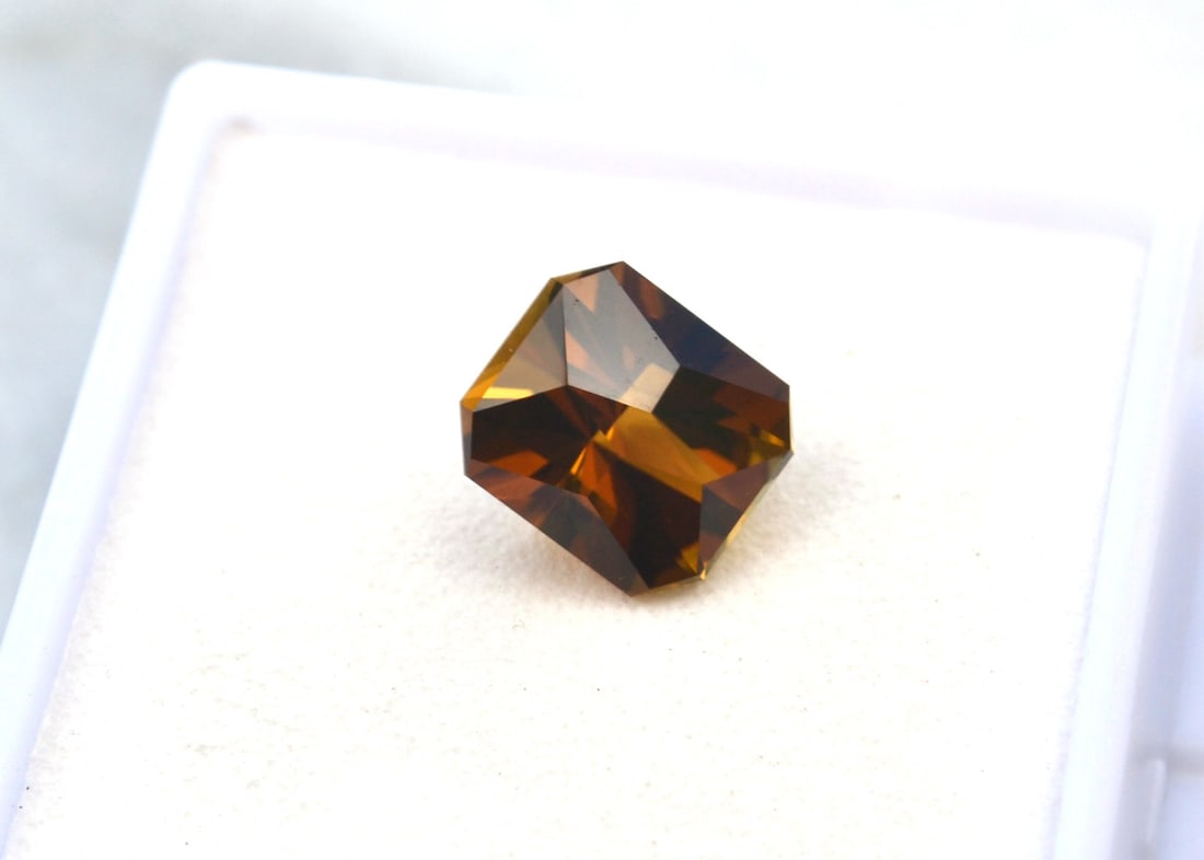 3.67 Carat Fancy Cut Dravite Tourmaline: Fantastic example of a Dravite Tourmaline, which is the form of Tourmaline that often comes in Orange. Dravites are rare and valuable, and this stone is no exception. It has a perfect cut and a nice