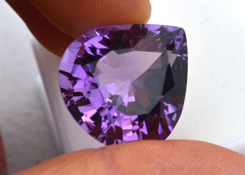 21.20 Carat Pear Cut Amethyst with Independent Wholesale Appraisal: Gorgeous Amethyst with an exceptional cut. Just a fantastic stone. Perfect color and clarity also. This gemstone comes with the pictured appraisal certificate from a GIA Graduate Gemologist in the San