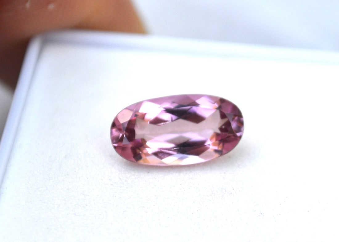 2.38 Carat Oval Cut Pink Tourmaline: Gorgeous Tourmaline here with vibrant Bubblegum Pink color. Just a beautiful stone for the Tourmaline lover. Natural and untreated. For Proxibid bidders, shipping is a flat rate of $6, no matter how m