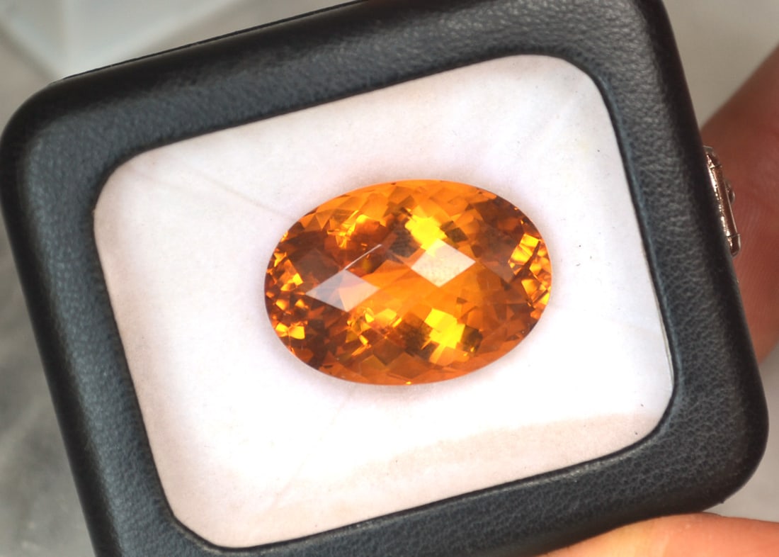 37.11 Carat Oval Checkerboard Cut Citrine: Fantastic Citrine. One of the nicest we've had. Just exceptional in every way. Natural and untreated. Most gems sold online aren't jewelry grade. They're either poorly cut, have weak color or too many