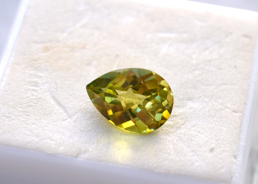 3.20 Carat Pear Checkerboard Cut Tourmaline: Beautiful Tourmaline with an unusual Greenishi-Yellow color. Bright and beautiful. Natural and untreated. Most gems sold online aren't jewelry grade. They're either poorly cut, have weak color or too