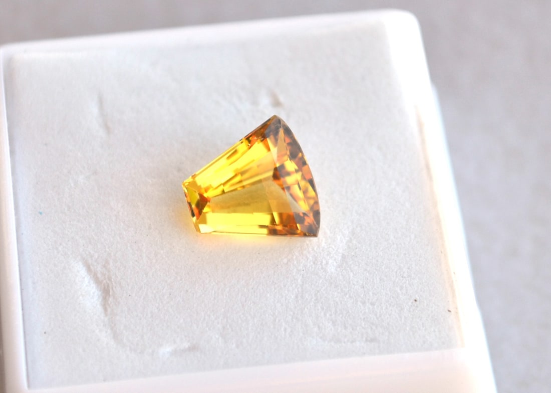 2.34 Carat Fancy Wedge Cut Heliodor: Beautiful example of a Heliodor with a fantastic fancy cut. Heliodor is in the Beryl family, along with Emerald and Aquamarine. So, as you can imagine, the value is quite high, especially for prime ex