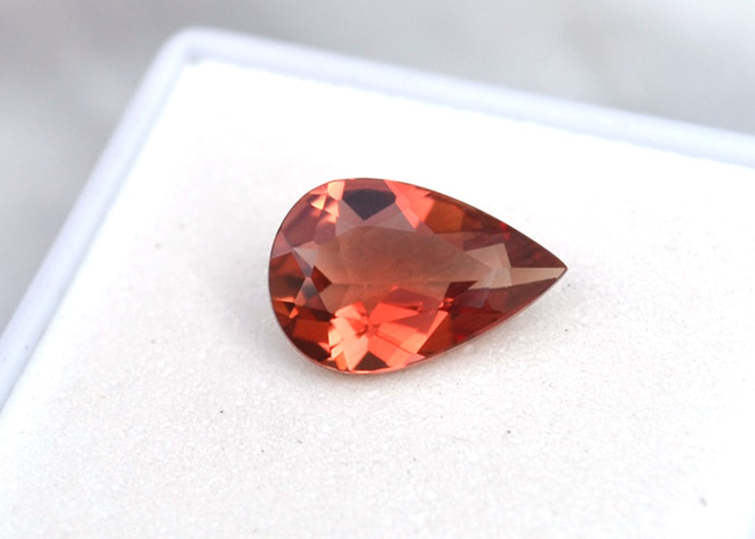 2.24 Carat Pear Cut Red Sunstone: Wow, what an exceptional Sunstone, most likely mined in Oregon, USA. Red Sunstone is nearly always mined in Oregon, so as you can imagine, the value is quite high. This stone is top red color and clea