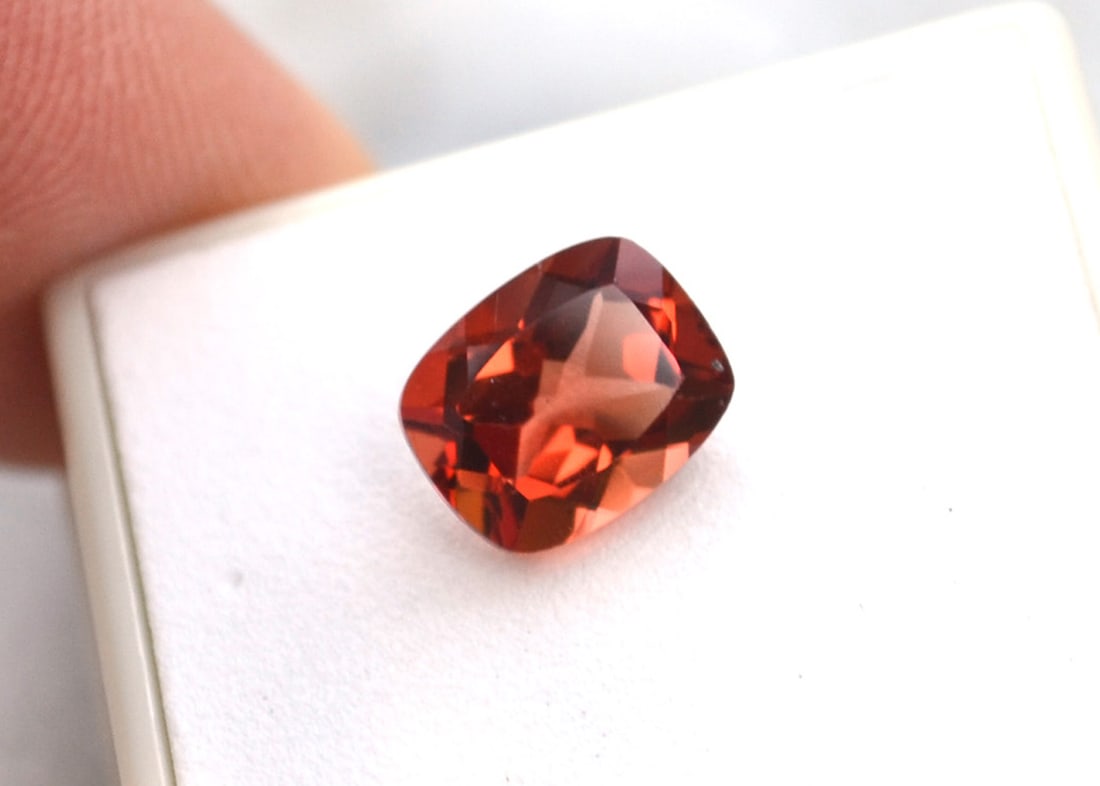 2.57 Carat Cushion Cut Red Sunstone: Wow, what an exceptional Sunstone, most likely mined in Oregon, USA. Red Sunstone is nearly always mined in Oregon, so as you can imagine, the value is quite high. This stone is top red color and clea