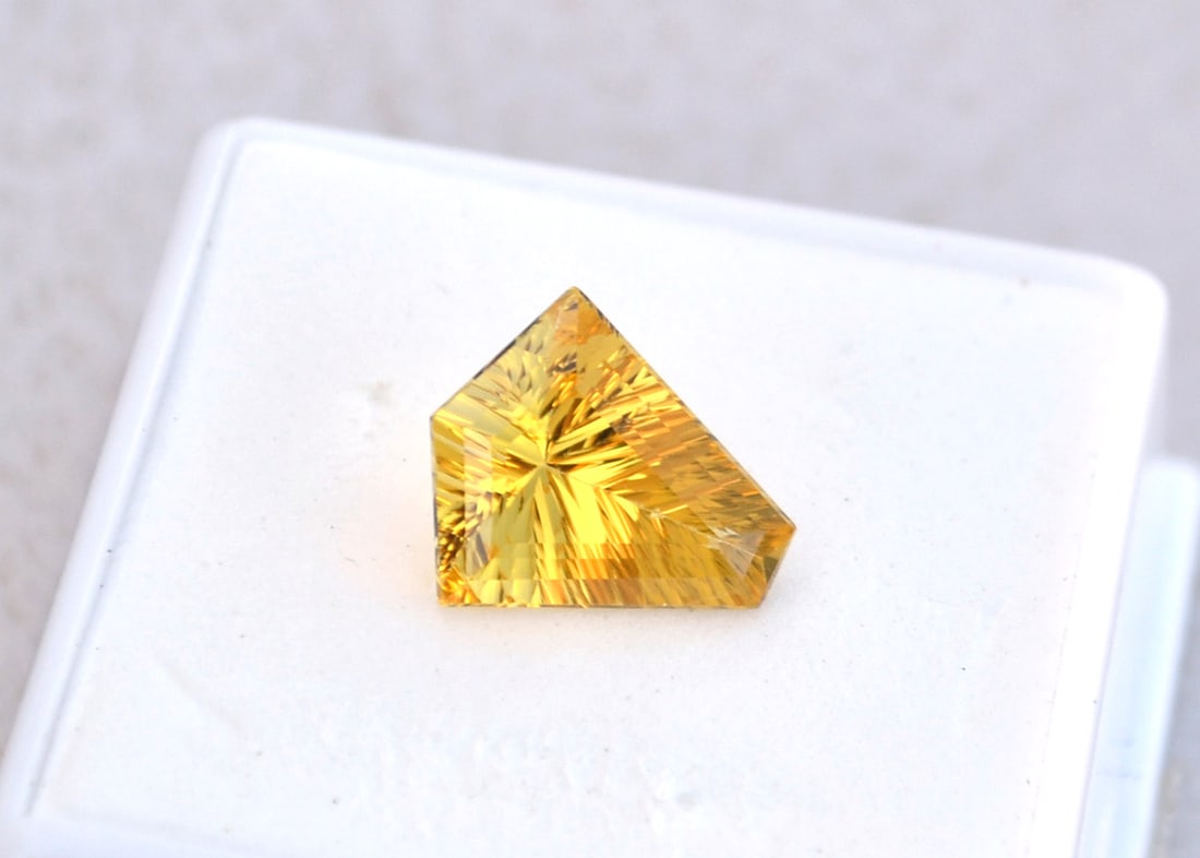3.13 Carat Fancy Kite Cut Heliodor: Beautiful example of a Heliodor with a fantastic fancy cut. Heliodor is in the Beryl family, along with Emerald and Aquamarine. So, as you can imagine, the value is quite high, especially for prime
