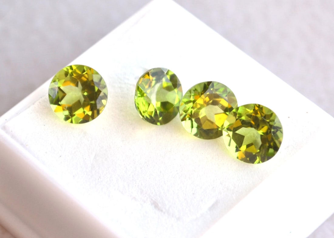 8.18 Carat Matched Set of Round Cut Peridots (1 of 4)