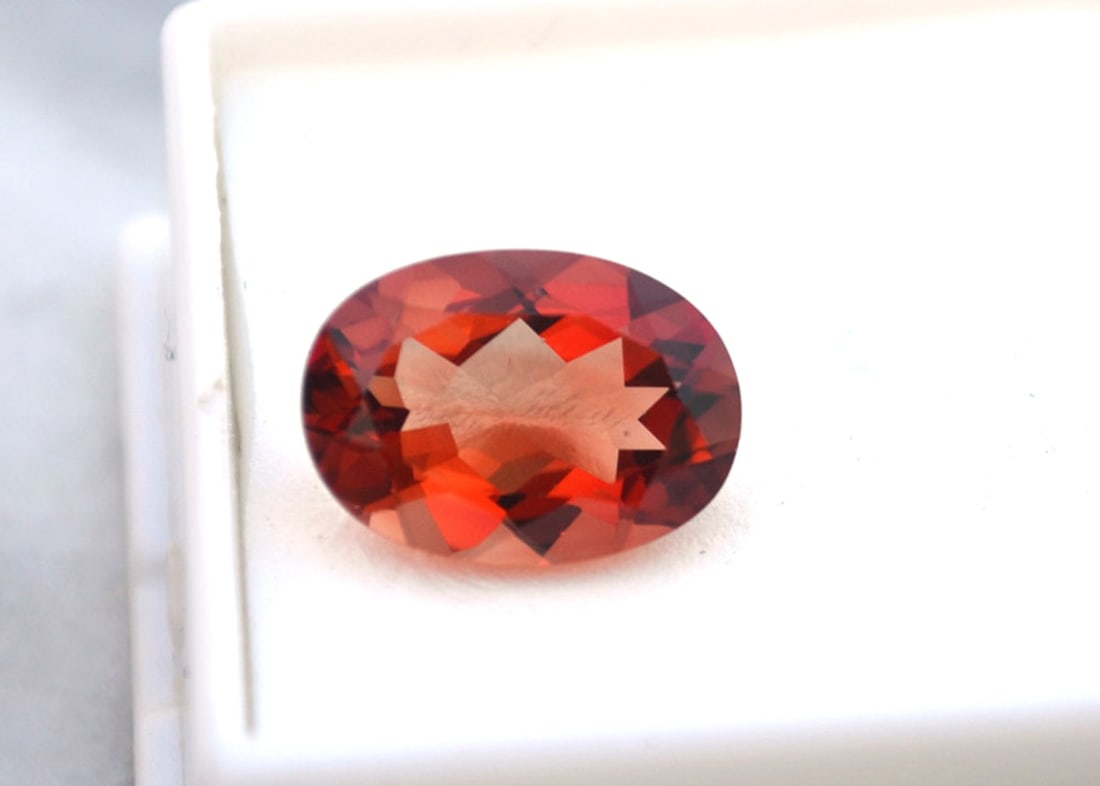 5.05 Carat Oval Cut Red Sunstone: Wow, what an exceptional Sunstone, most likely mined in Oregon, USA. Red Sunstone is nearly always mined in Oregon, so as you can imagine, the value is quite high. This stone is top red color and