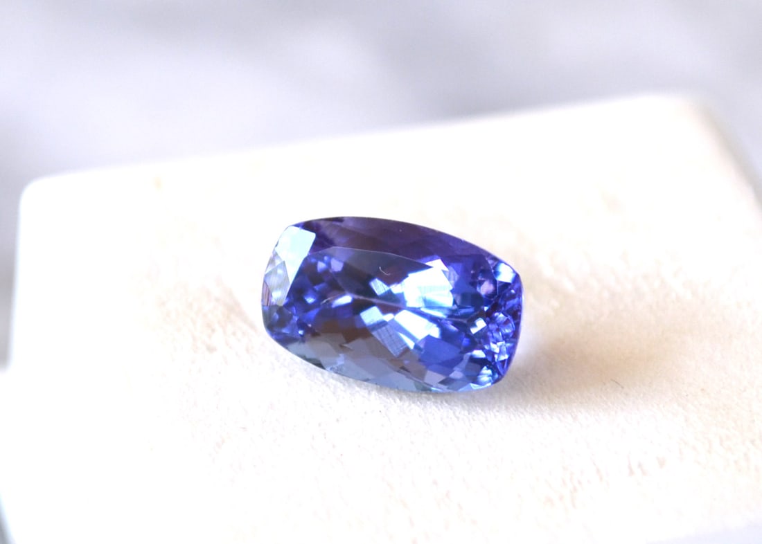 4.10 Carat Cushion Cut Tanzanite: Gorgeous Tanzanite. Perfect in every way. Top color with great cutting and clarity. You won't find a nicer Tanzanite at this price anywhere else. Natural stone. All Tanzanites are gently heated to