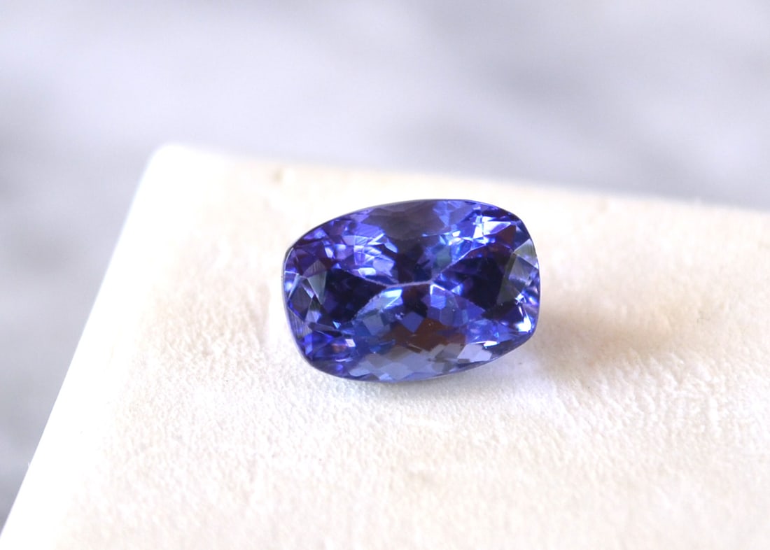 4.25 Carat Cushion Cut Tanzanite: Gorgeous Tanzanite. Perfect in every way. Top color with great cutting and clarity. You won't find a nicer Tanzanite at this price anywhere else. Natural stone. All Tanzanites are gently heated to bri