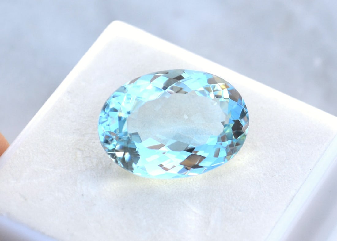 10.56 Carat Oval Cut Aquamarine: Fantastic Aquamarine with strong color. Just a great stone for the price. Natural and untreated. Most gems sold online aren't jewelry grade. They're either poorly cut, have weak color or too many incl