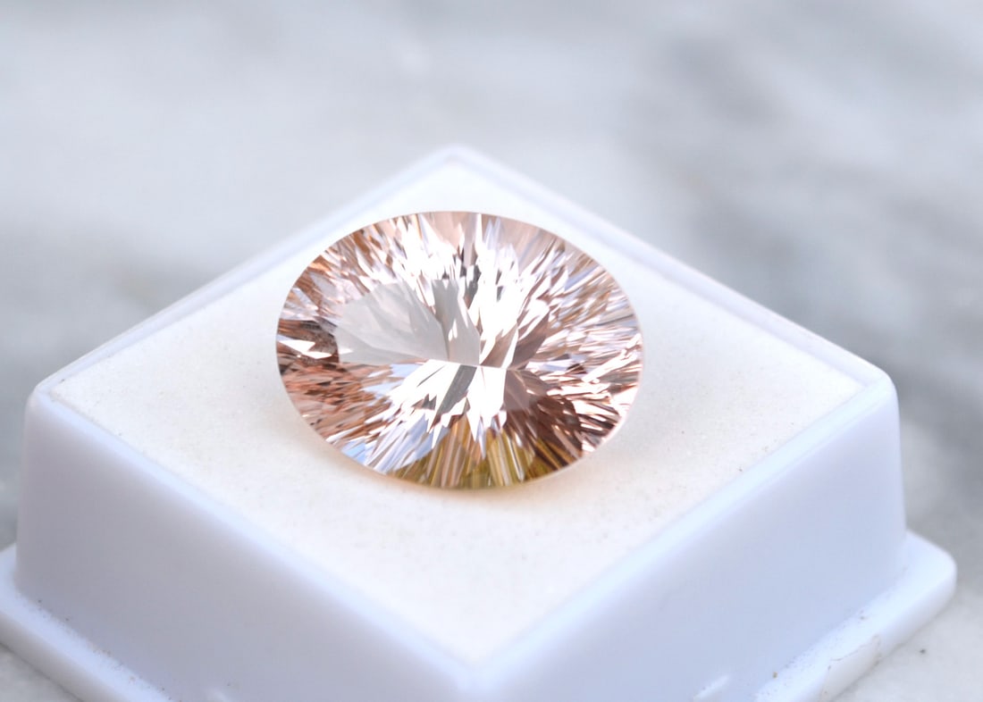 15.68 Carat Fancy Oval Cut Morganite: Amazing Morganite here. One of the nicest we've seen. Just an exceptional stone for the price. $50 per carat is very well below wholesale. Natural and untreated. Most gems sold online aren't jewelry