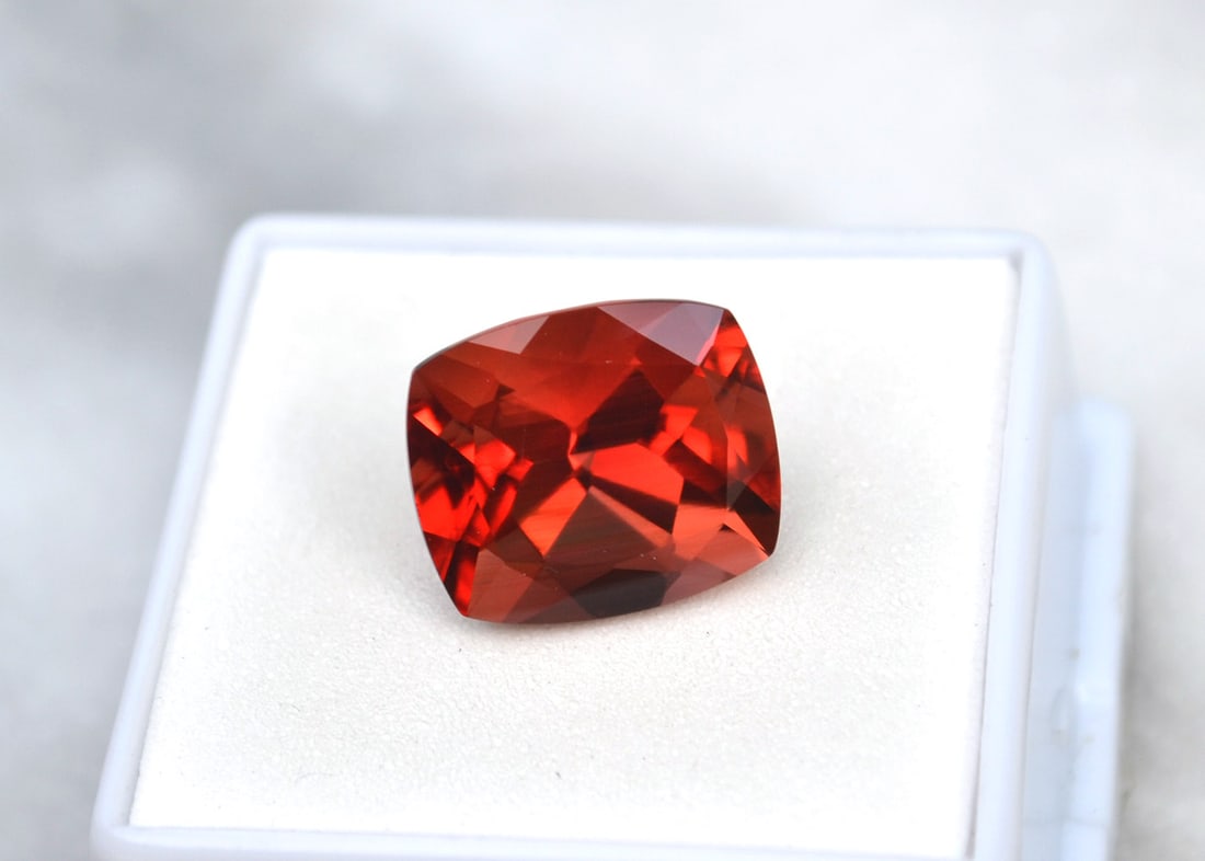 8.42 Carat Cushion Cut Red Sunstone: Wow, what an exceptional Sunstone, most likely mined in Oregon, USA. Red Sunstone is nearly always mined in Oregon, so as you can imagine, the value is quite high. This stone is top red color and
