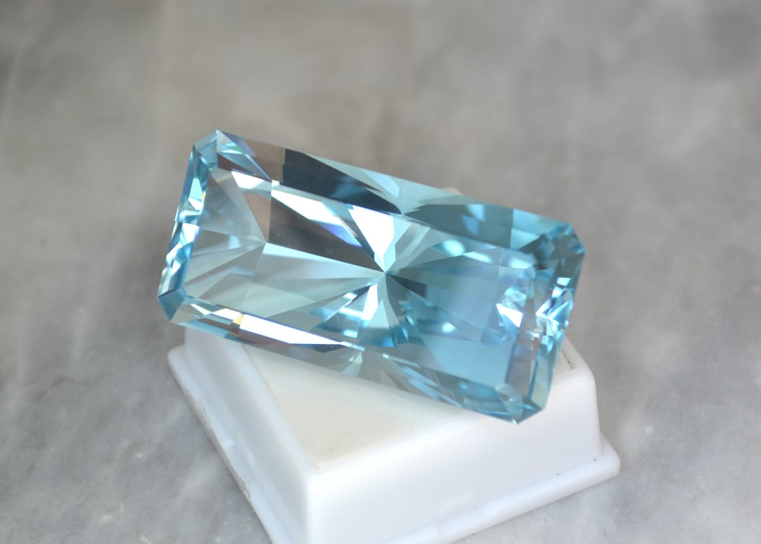 184.25 Carat GIA Certified Topaz: Just an outstanding Topaz here, easily the nicest we've ever had. The cut on this stone is truly exceptional and the color is strong for a Sky Blue. Comes with the pictured GIA certificate, which