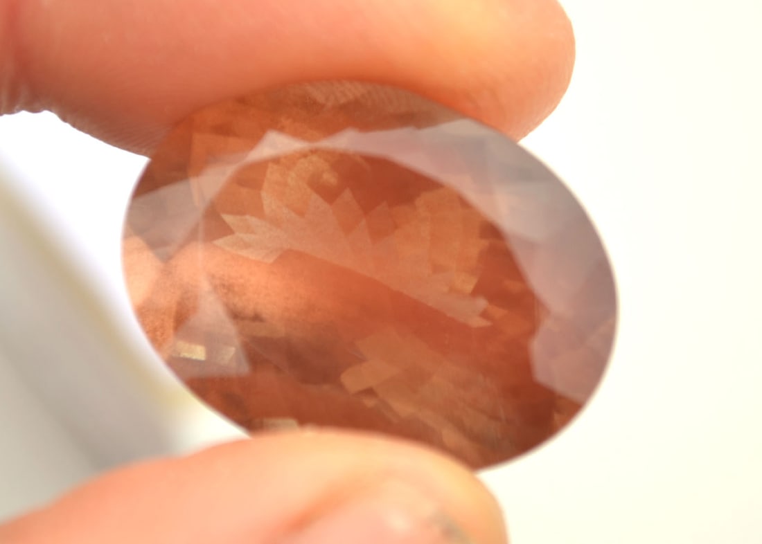 33.12 Carat Oval Cut Sunstone with Schiller: Wow, what an incredible and large Sunstone. This Sunstone has a ton of "Schiller", which is a phenomenon completely unique to Sunstone. As you can see from the pictuers, when this stone is rotated at