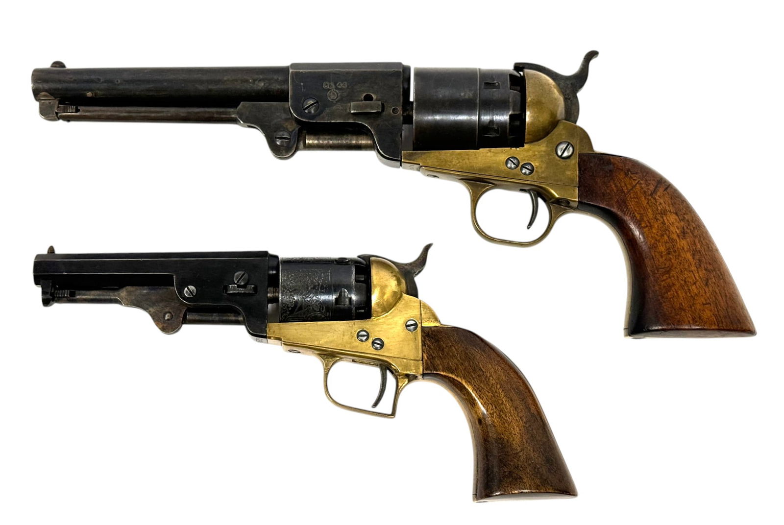 Pair of Blackpowder Percussion Replica Revolvers: 1- Navy Arms .44 CAL. Italian Fully Functioning Reproduction by Uberti- S#: 4173 | 6.5" Barrel | 6-shot SA | Overall in moderate condition with missing barrel wedge screw, no hammer spring. Needs work