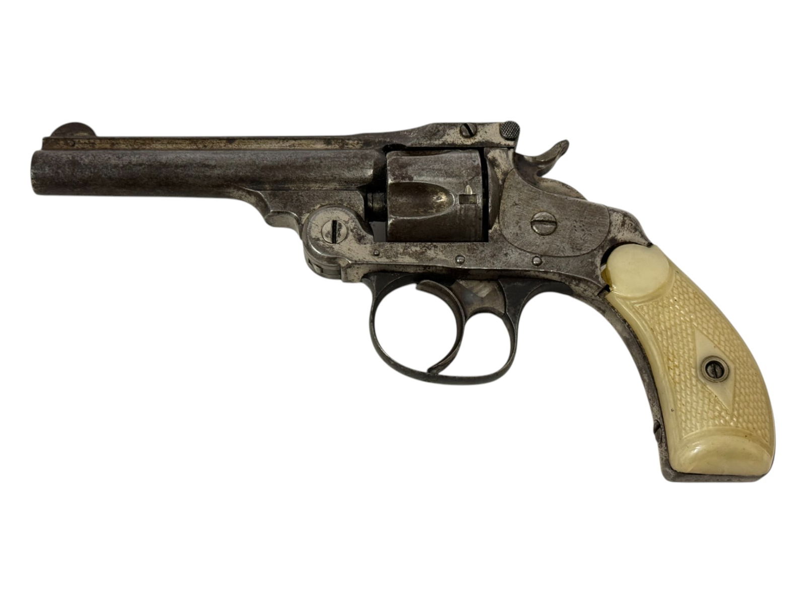 Antique Smith & Wesson .32 S&W Double Action 4th Model Top Break Revolver: S#: 141332, matching on cylinder and top latch |Mfg. 1890s | 3.5" Barrel | 5-shot SA/DA | Faux pearl plastic grips | Top of barrel stamped “Smith & Wesson Springfield Mass. U.S.A. Pat'd Jan. 24.