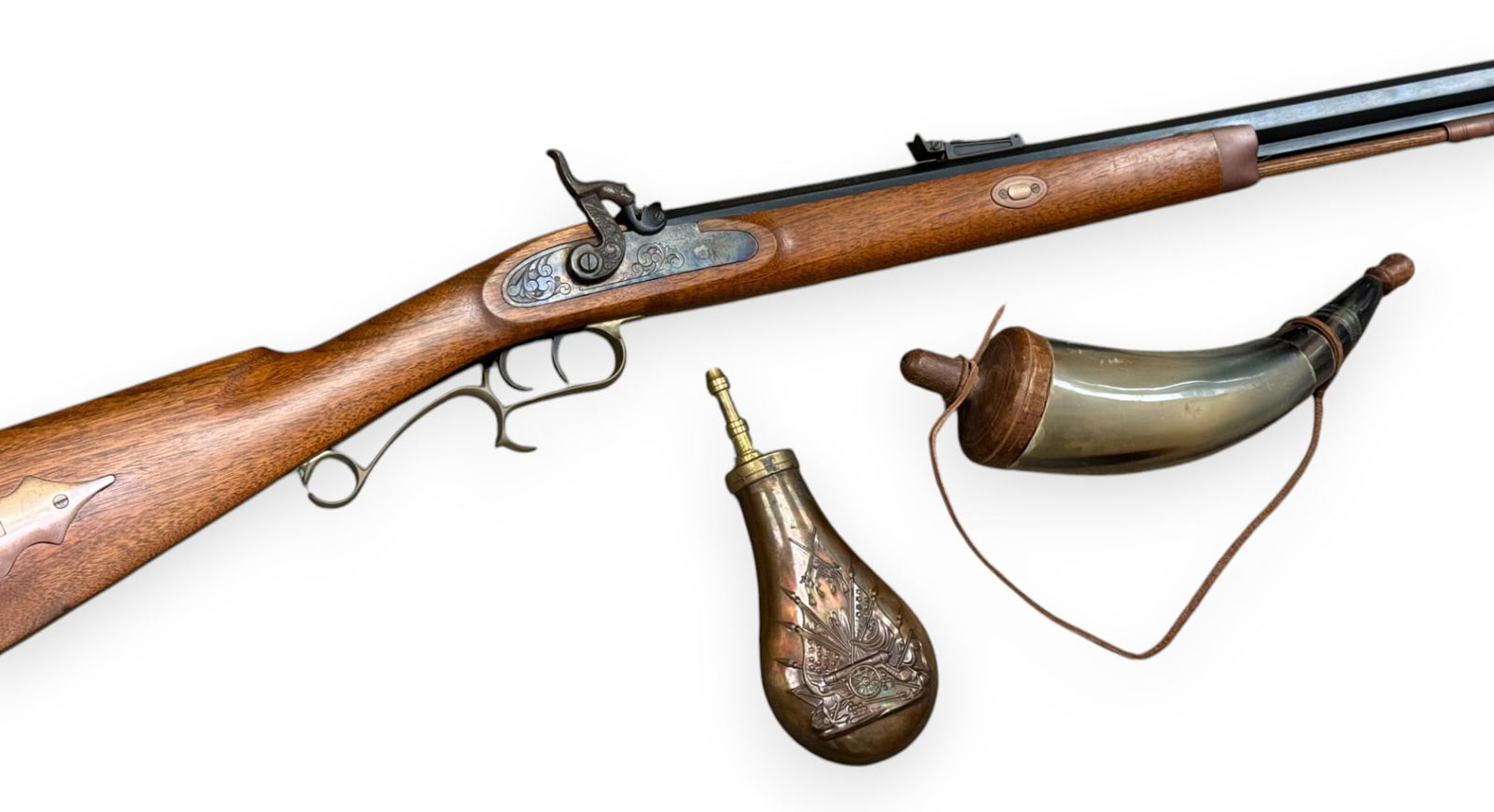 Excellent T/C Arms 50 CAL. Half Stock Blackpowder Percussion Rifle with Powder Horn and Flask: S#: 111683 | 28" Octagonal Barrel | 14.5" LOP | Adjustable rear sight with bladed bead front sight | Comes with ramrod | Nicely engraved lock plate | Brass hardware | Comes with a nice powder horn and