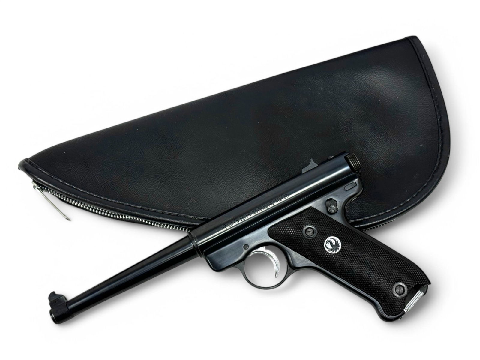 Excellent 1966 Ruger MK 1 Standard "Silver Eagle" .22 LR Semi-Automatic Pistol with Soft Case: S#: 433662 | Mfg. 1966 | 6" Barrel | Comes with (1) magazine and leather soft case | Silver base plate matches trigger finish and Silver eagle medallion on grip |||| CONDITION: Excellent, like new. Be