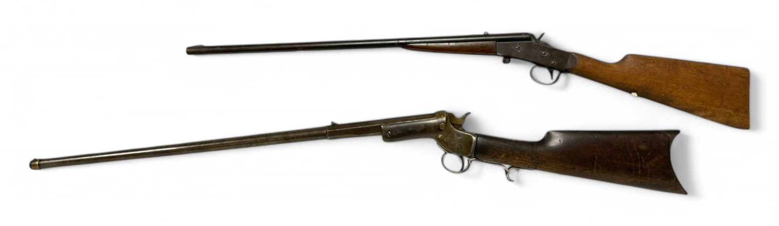 Pair of Vintage J. Stevens Single-Shot Rifles: (1)- J. Stevens Tip-Up .32 SHORT Rifle- S#: 15901 | 24" Octagonal/Round Barrel | Seems to mechanically function for the most part | Bore is dark and rusty | See photos for overall condition ||||| CLAS