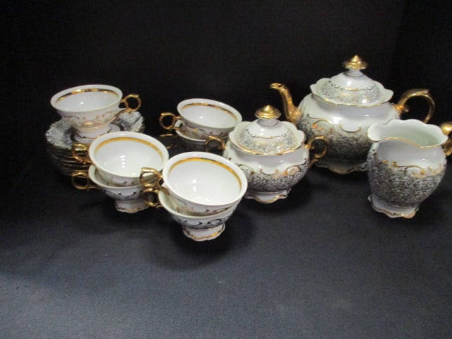 Vintage Haus Dresden "Baroque-Style" China Tea Set: 7 3/4" teapot, 5" creamer, 6" covered sugar, (8) 5 3/4" saucer, (7) 2 1/2" cups, made in Western Germany