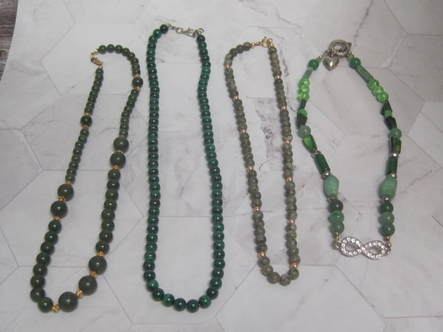 Four Green Bead Necklaces: .