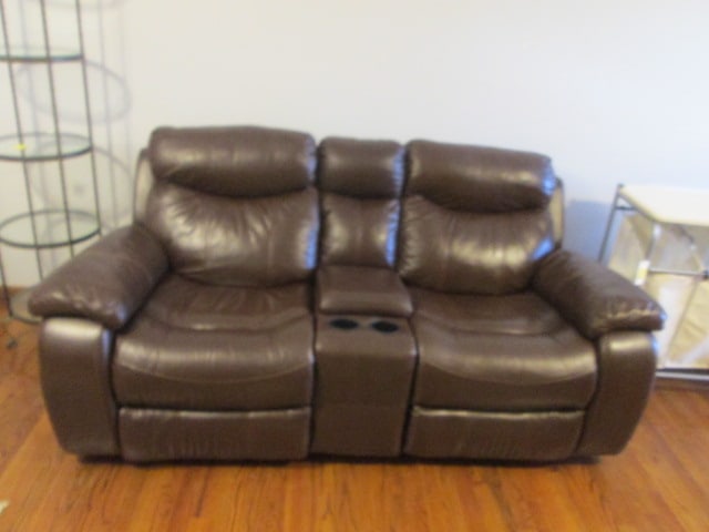 Cognac "Wrangler" Faux Leather Double Glider Recliner Sofa: 80"long, each end is glider recliners, center has cup holders with remote storage, remote storage has USB charging ports, Local Pickup Only