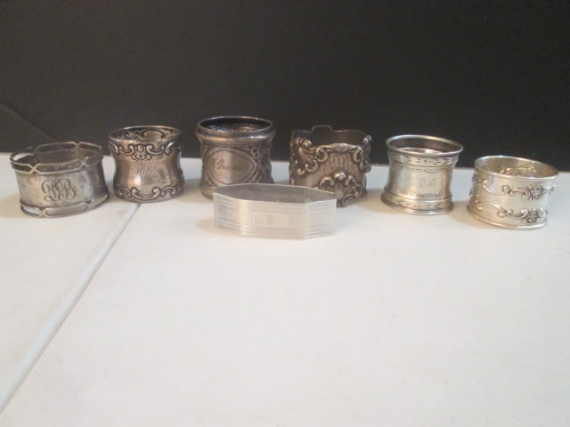 Seven Vintage Sterling Napkin Rings: Total weight 5.85 troy ounces, all have engravings