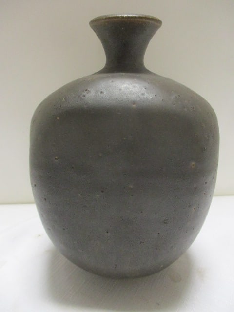 Vintage Pottery Jug with Unique Makers Mark on Bottom.: 5 1/2'' x 8''.