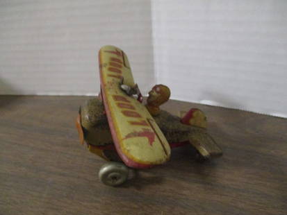 Vintage "Loop the Loop" Wind-Up Tin Litho Toy Airplane: 4", some rust and wear