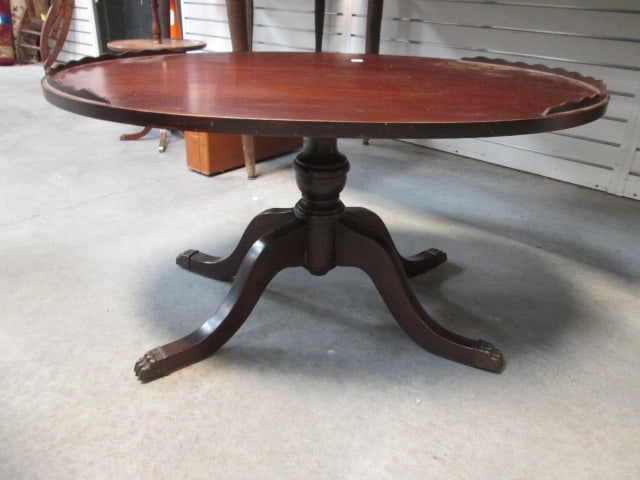 Duncan Phyfe Mahogany Coffee Table with Brass Cap Claw Feet: 34" x 22" x 18 1/4"(top of end rails), some veneer damage on edges, Local Pickup Only